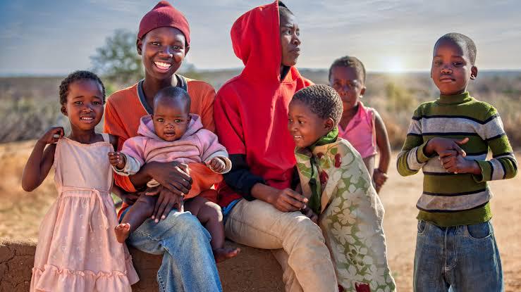 Children and community members supported by Food Rights Alliance